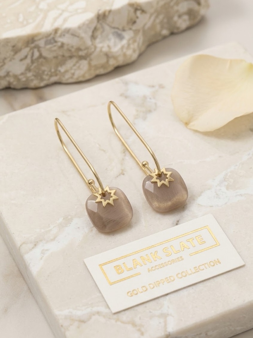 A484. Gold Dipped and Quartz Star Drop Earrings